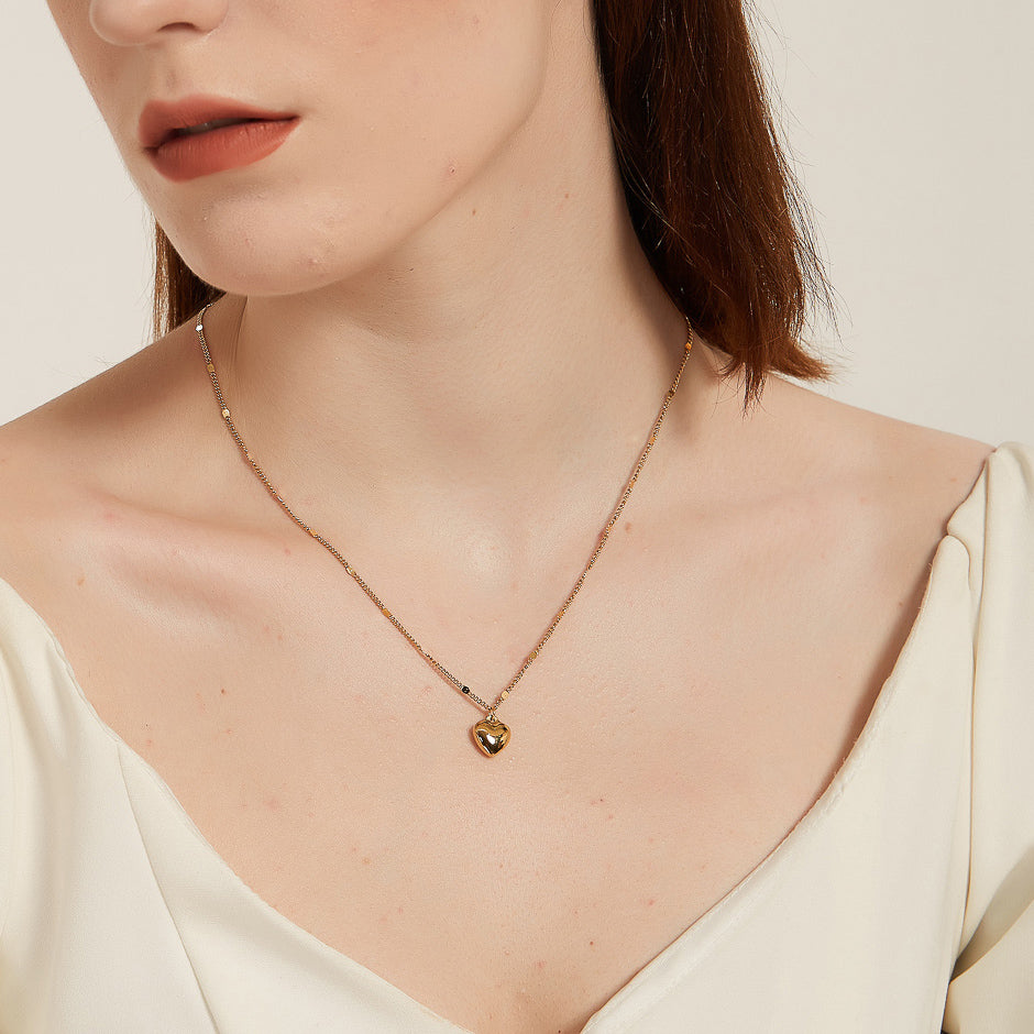 Stephanie gold puffy heart charm pendant necklace