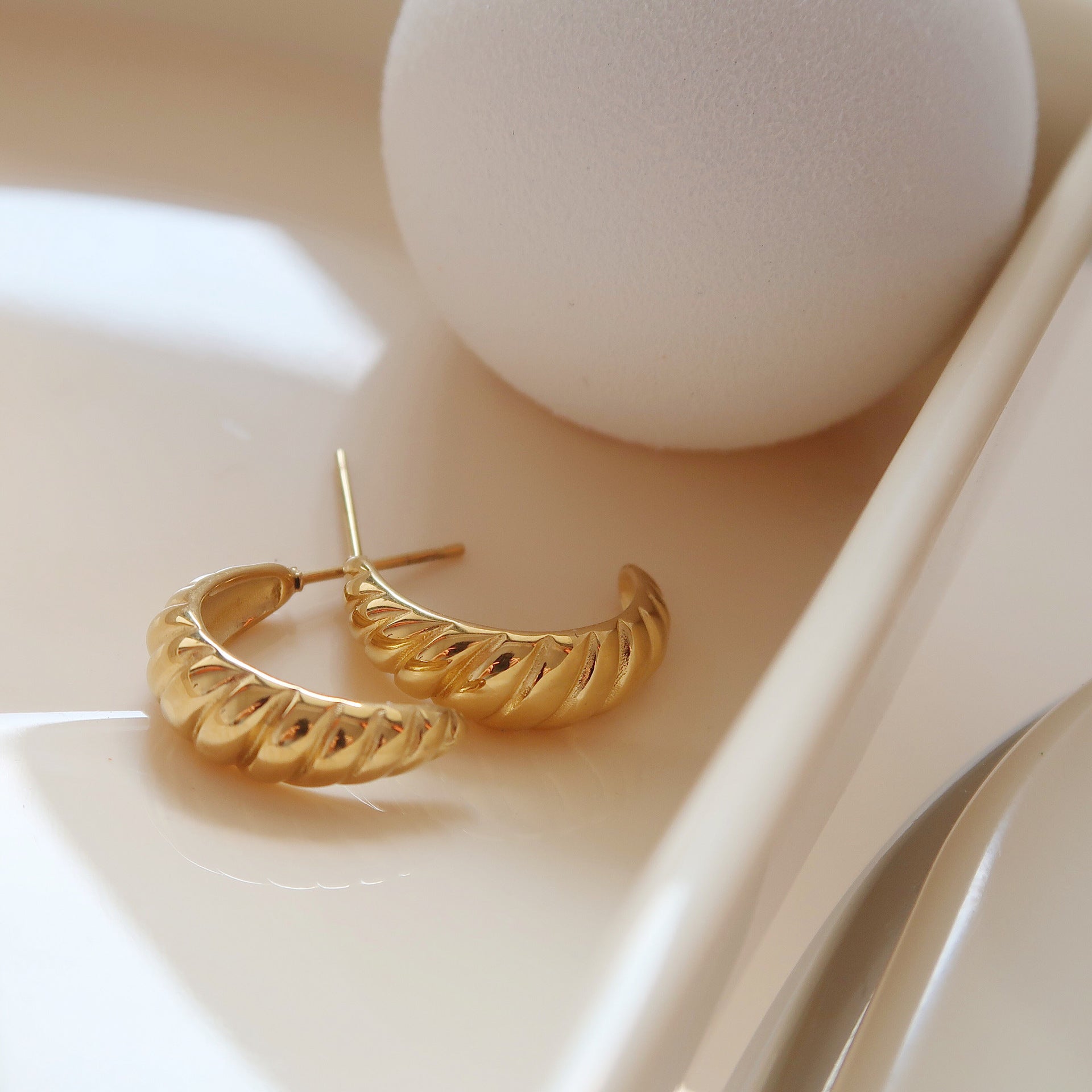 Rosey croissant twisted open hoop earrings