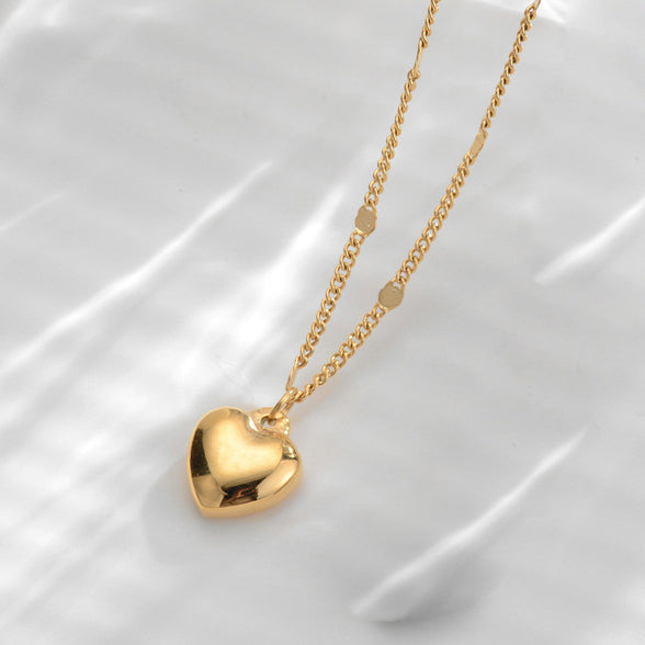 Stephanie gold puffy heart charm pendant necklace